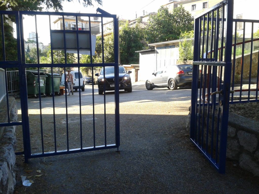 Blue iron gate opened