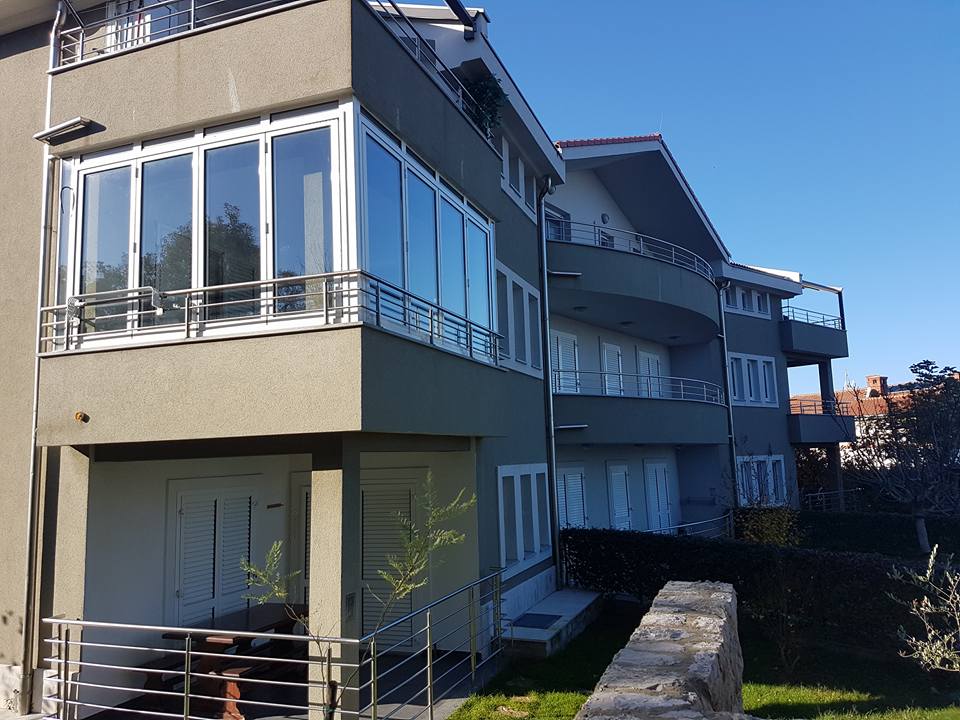 House with inox fence