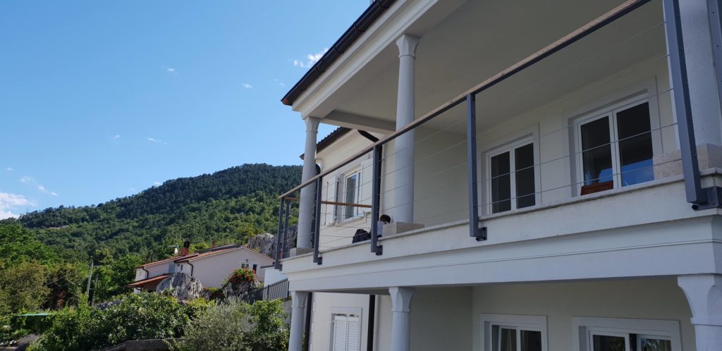 Black cable fence on balcony